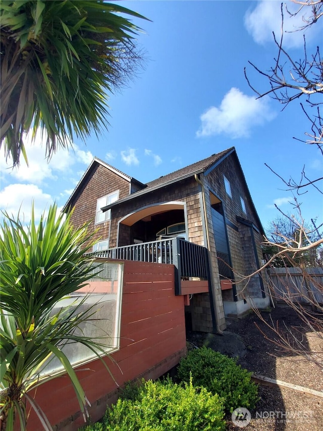 view of property exterior featuring a balcony