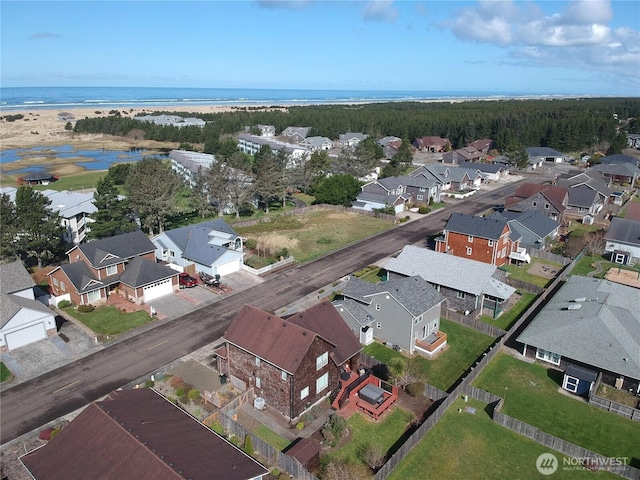 aerial view with a residential view and a water view