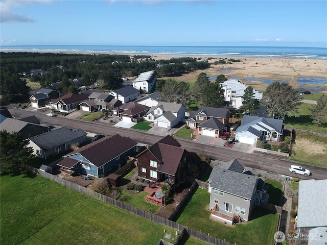 aerial view with a residential view and a water view