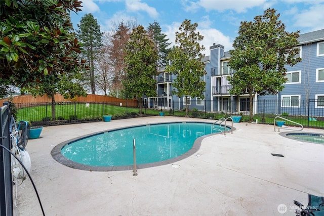 12519 SE 41st Pl Unit B103, Bellevue, WA 98006 - pool with a patio area and fence