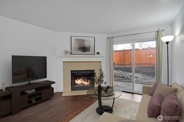 12519 SE 41st Pl Unit B103, Bellevue, WA 98006 - living room with a tile fireplace and wood finished floors