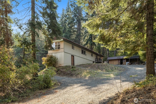 view of side of home with a garage