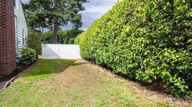 view of yard featuring fence