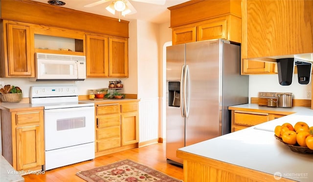 kitchen with white appliances, light wood-style flooring, open shelves, a ceiling fan, and light countertops