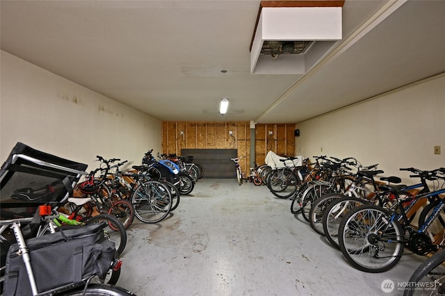 7021 Sand Point Way Unit B319, Seattle, WA 98115 - garage featuring bike storage and a heating unit