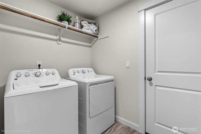 705 Ava St, Walla Walla, WA 99362 - laundry room with independent washer and dryer, light wood-style flooring, and baseboards