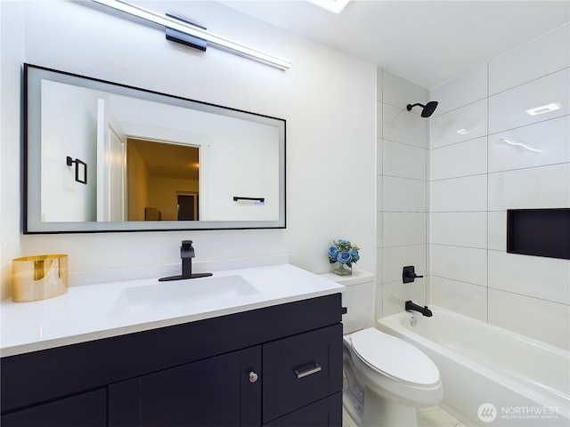 full bath featuring toilet, vanity, and shower / bathtub combination