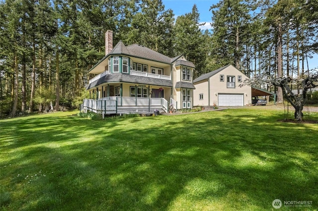 view of front facade featuring a front lawn, a porch, a chimney, and a garage