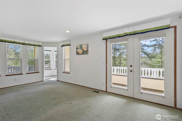 interior space featuring baseboards, french doors, and recessed lighting