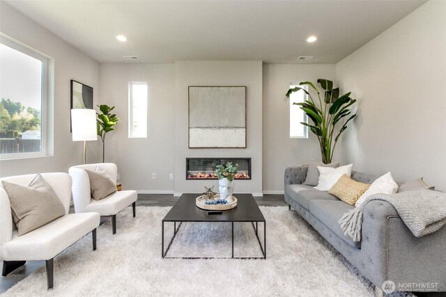 13815 Brookdale Ln E Unit 107, Tacoma, WA 98445 - living area featuring baseboards, recessed lighting, and wood finished floors