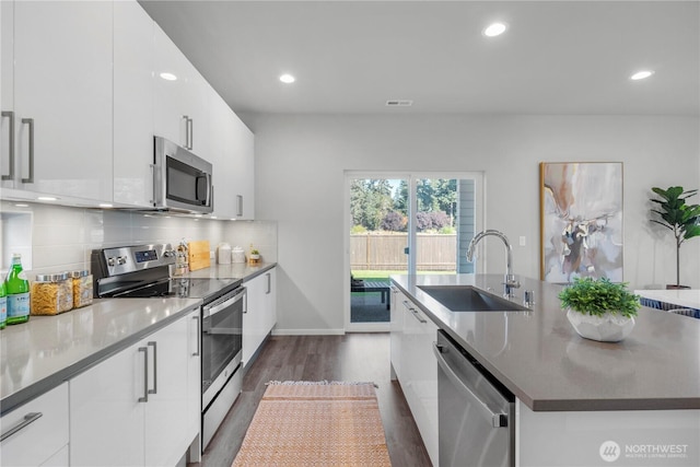 13815 Brookdale Ln E Unit 107, Tacoma, WA 98445 - kitchen with a sink, appliances with stainless steel finishes, a kitchen island with sink, and modern cabinets
