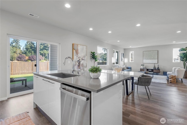 13815 Brookdale Ln E Unit 107, Tacoma, WA 98445 - kitchen with stainless steel dishwasher, open floor plan, white cabinets, and a sink