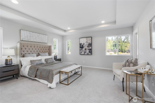 13815 Brookdale Ln E Unit 107, Tacoma, WA 98445 - bedroom featuring a tray ceiling, baseboards, recessed lighting, and carpet flooring