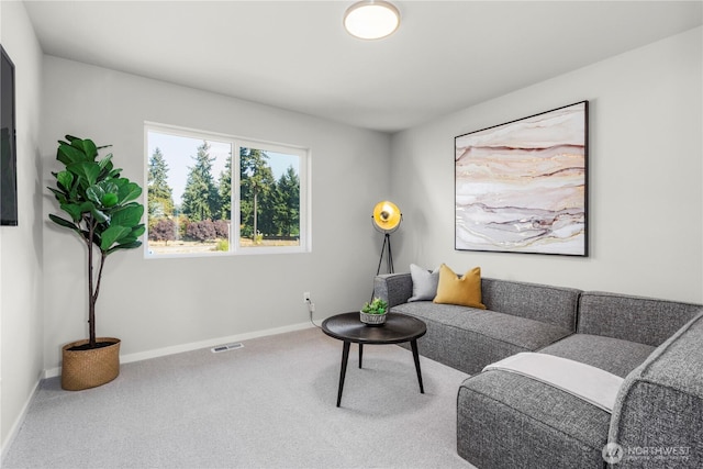 13815 Brookdale Ln E Unit 107, Tacoma, WA 98445 - carpeted living room featuring baseboards and visible vents