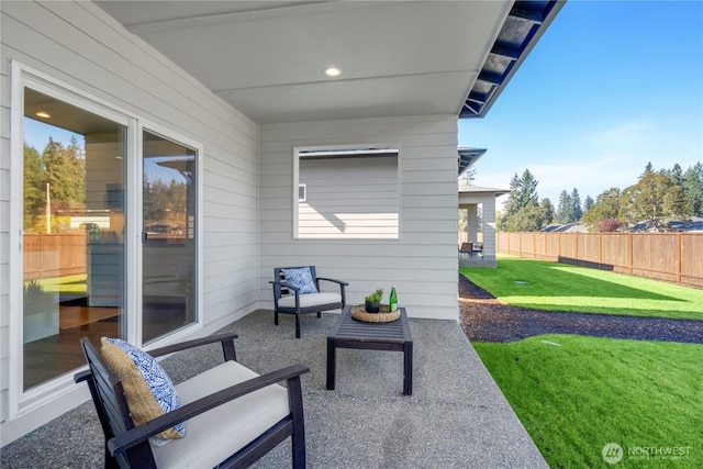 13815 Brookdale Ln E Unit 107, Tacoma, WA 98445 - view of patio featuring fence