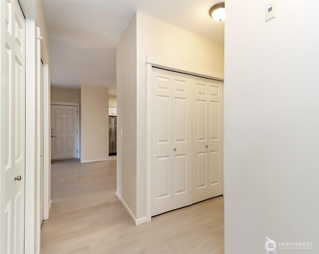 15026 40th Ave W Unit 7-203, Lynnwood, WA 98087 - hall with baseboards and light wood-type flooring