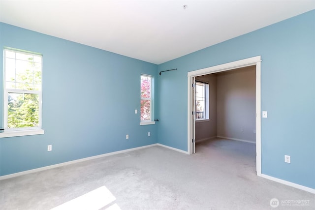 15026 40th Ave W Unit 7-203, Lynnwood, WA 98087 - carpeted spare room featuring baseboards