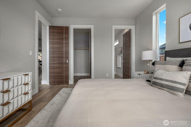 1515 141st St E Unit 72, Tacoma, WA 98445 - bedroom featuring wood finished floors, a closet, and baseboards