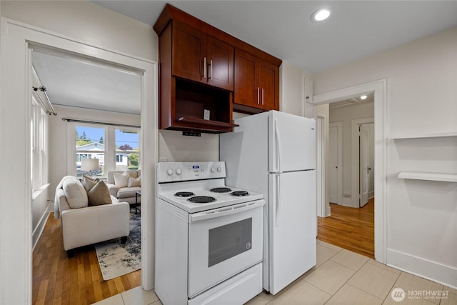 kitchen with recessed lighting, light tile patterned floors, open shelves, and white appliances