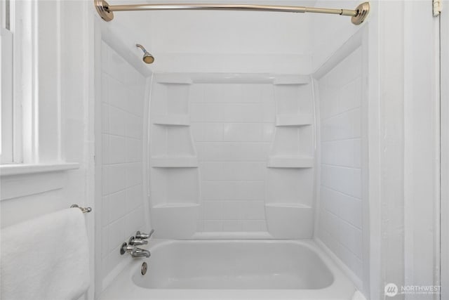 full bath featuring shower / tub combination