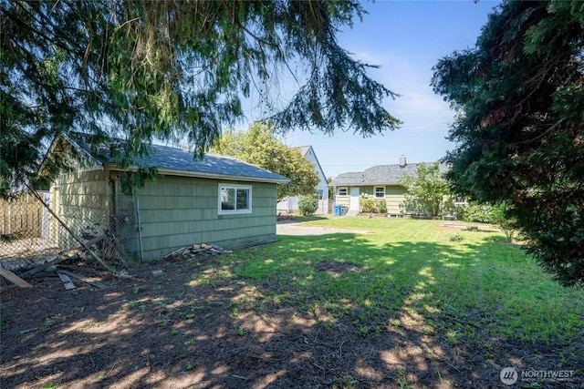 view of yard featuring fence