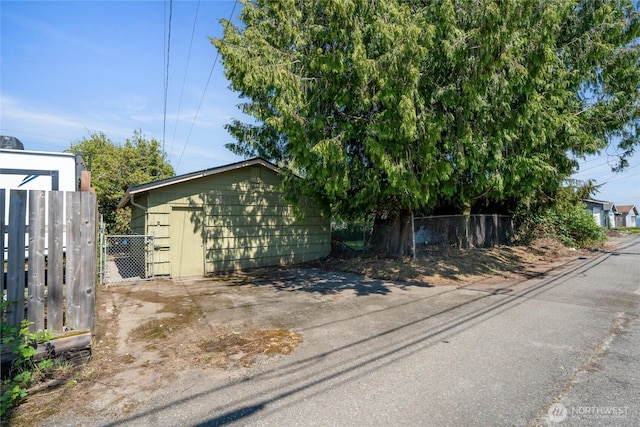 view of home's exterior featuring fence