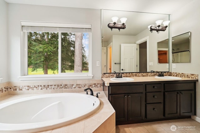 4335 Dudley Dr NE, Lacey, WA 98516 - bathroom with a sink, tile patterned floors, double vanity, and a bath
