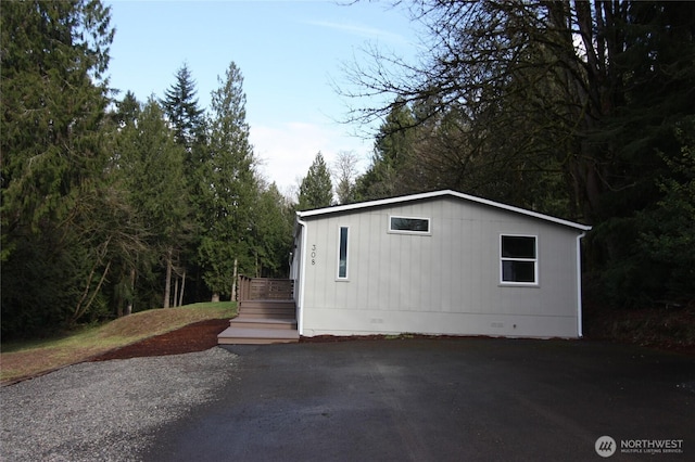 view of front of home featuring crawl space