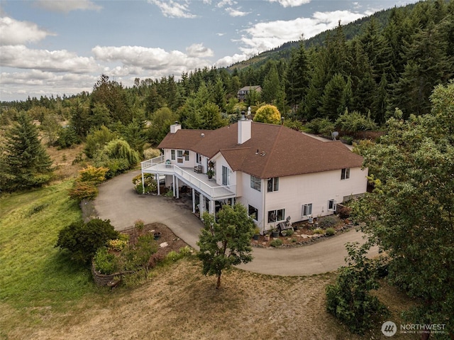 bird's eye view with a forest view