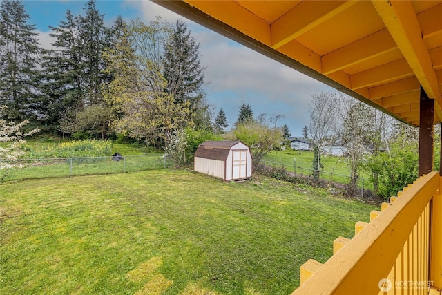1023 S 88th St, Tacoma, WA 98444 - view of yard with a shed, a fenced backyard, and an outdoor structure