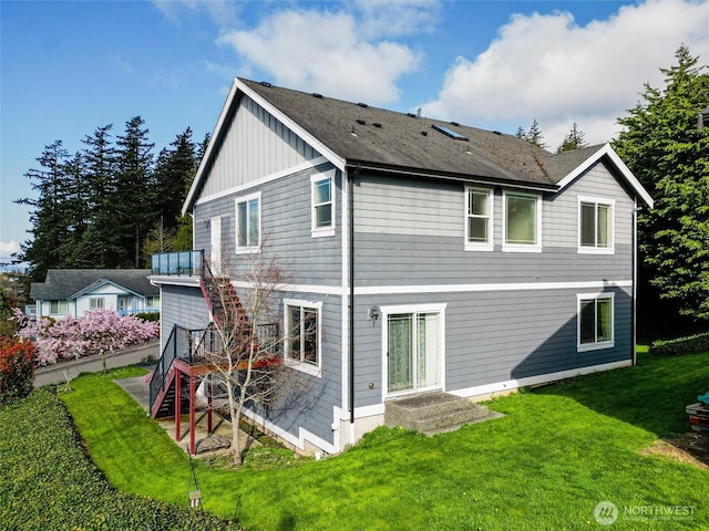 660 Parkside Pl, Blaine, WA 98230 - rear view of property with a lawn and stairs