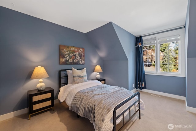 bedroom with carpet flooring, visible vents, and baseboards