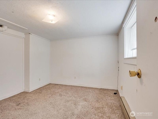 8434 34th Ave S, Seattle, WA 98118 - spare room with carpet floors, a textured ceiling, and baseboards