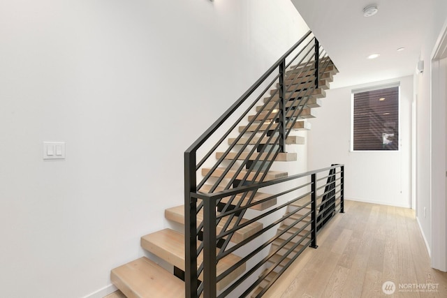 3929 2nd Ave NE, Seattle, WA 98105 - stairway featuring baseboards and wood finished floors