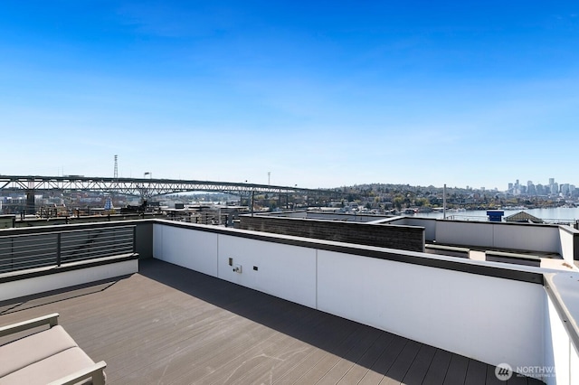 3929 2nd Ave NE, Seattle, WA 98105 - wooden terrace with a city view
