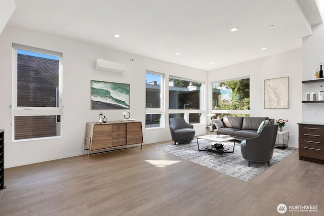 3929 2nd Ave NE, Seattle, WA 98105 - living room featuring baseboards, wood finished floors, an AC wall unit, and recessed lighting
