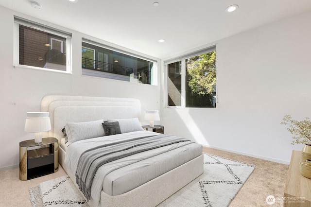 3929 2nd Ave NE, Seattle, WA 98105 - carpeted bedroom with baseboards and recessed lighting