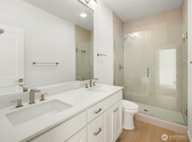 25520LOT22 204th Pl SE, Covington, WA 98042 - full bath with toilet, a sink, a stall shower, and double vanity