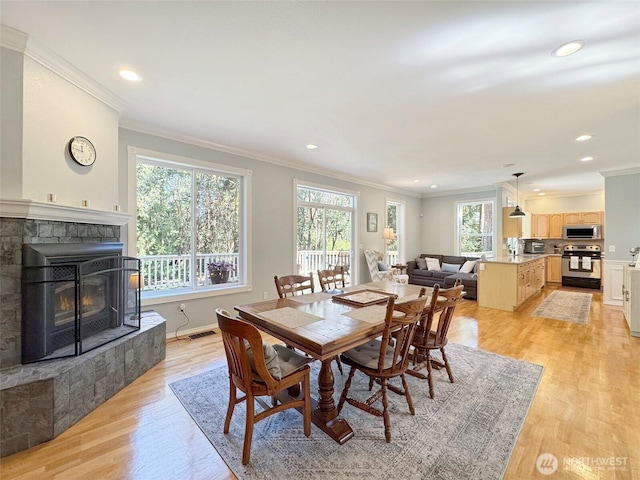 861 Kirner Rd, Sequim, WA 98382 - dining room with ornamental molding, healthy amount of natural light, light wood finished floors, recessed lighting, and baseboards