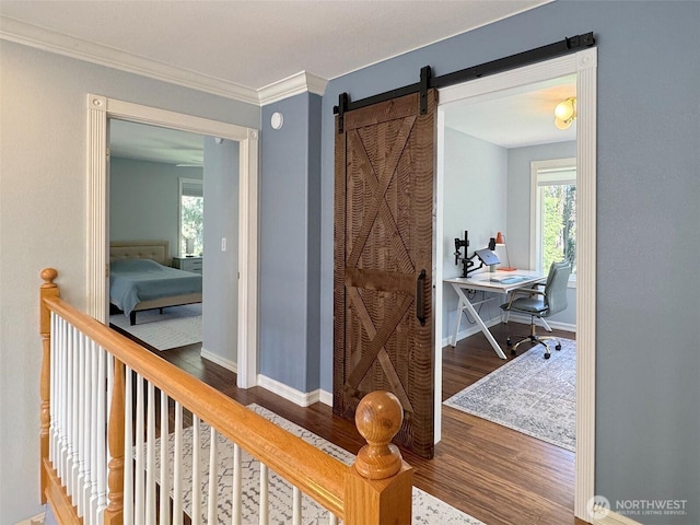 861 Kirner Rd, Sequim, WA 98382 - hall featuring wood finished floors, baseboards, healthy amount of natural light, an office area, and ornamental molding
