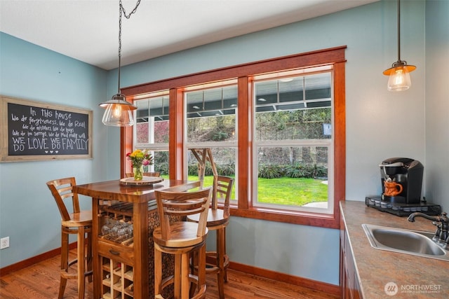 14900 NE Critter Hill Dr, Amboy, WA 98601 - dining room featuring wood finished floors and baseboards