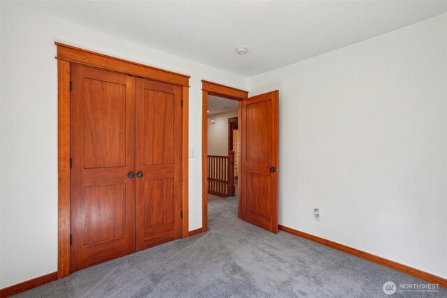 14900 NE Critter Hill Dr, Amboy, WA 98601 - unfurnished bedroom featuring carpet floors and baseboards
