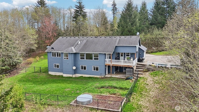 14900 NE Critter Hill Dr, Amboy, WA 98601 - back of property with a wooden deck and a shingled roof