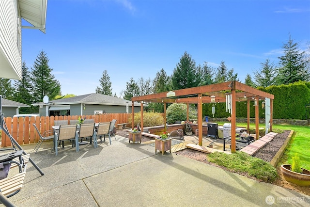 view of patio with fence, outdoor dining area, and a pergola