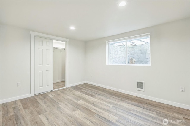 201 S 60th St, Tacoma, WA 98408 - unfurnished bedroom featuring recessed lighting, light wood-style floors, baseboards, and visible vents