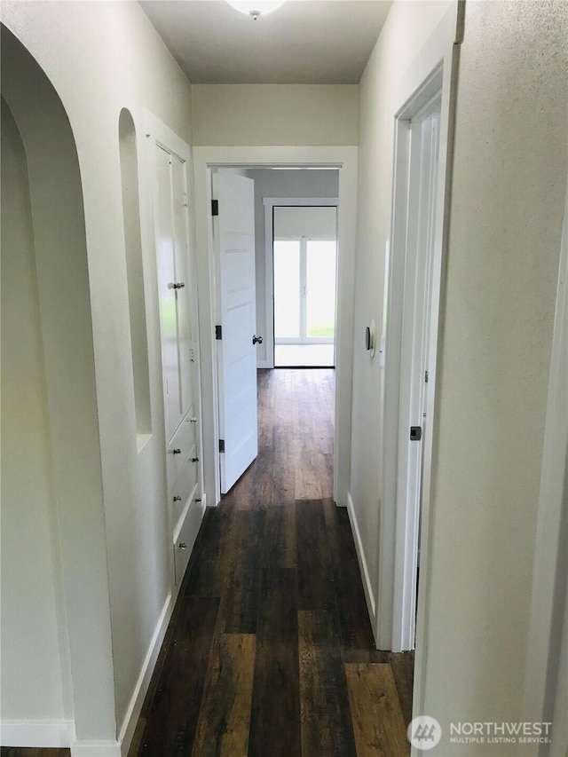 201 S 60th St, Tacoma, WA 98408 - hallway with baseboards and dark wood finished floors