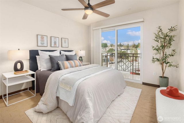 413 NE 70th St Unit 402, Seattle, WA 98115 - bedroom featuring baseboards, access to exterior, and ceiling fan