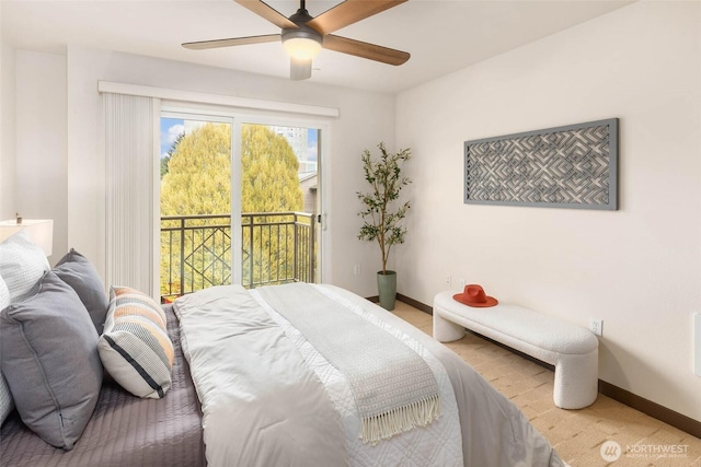 413 NE 70th St Unit 402, Seattle, WA 98115 - bedroom featuring baseboards, access to outside, and ceiling fan