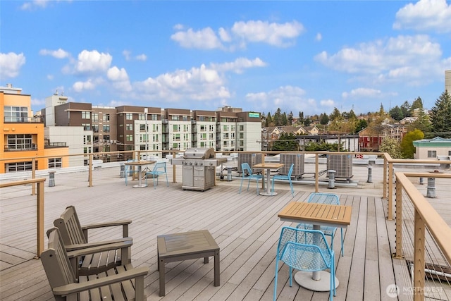 413 NE 70th St Unit 402, Seattle, WA 98115 - wooden terrace with area for grilling