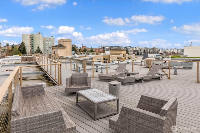 413 NE 70th St Unit 402, Seattle, WA 98115 - wooden terrace featuring an outdoor hangout area and a view of city
